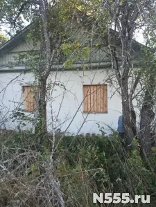 нежилое здание с земельным участком